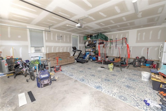 8851 Topeka Rd, Quinton, VA 23141 - garage featuring a garage door opener and cooling unit