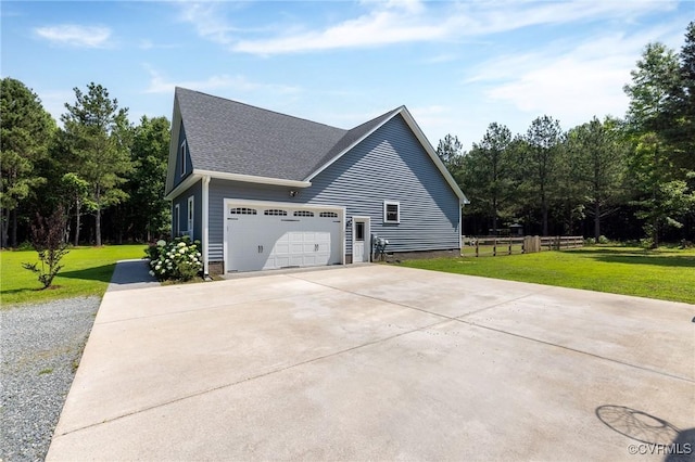 8851 Topeka Rd, Quinton, VA 23141 - view of side of home featuring driveway, roof with shingles, and an attached garage