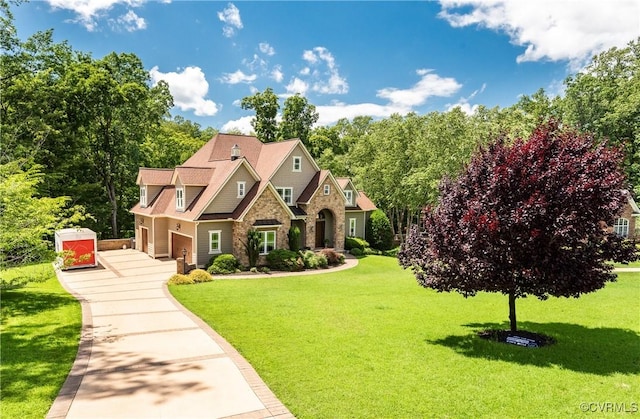 2631 Royal Crest Dr, Midlothian, VA 23113 - view of front facade with stone siding, driveway, a front lawn, and a garage