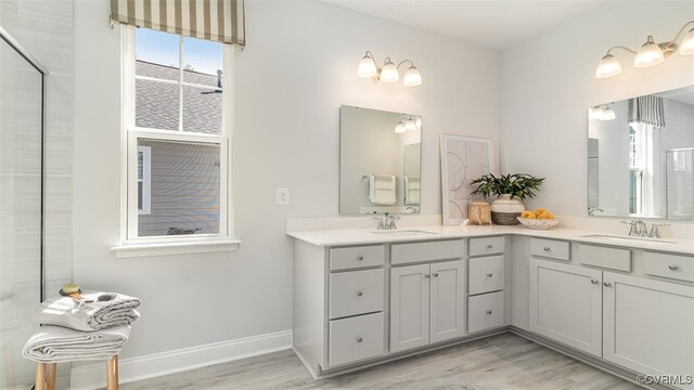 7007 Greenholm Pl, Chesterfield, VA 23234 - full bathroom with wood finished floors and double vanity