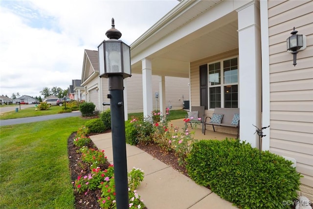 7822 James Blair Ln, New Kent, VA 23124 - covered porch with a yard