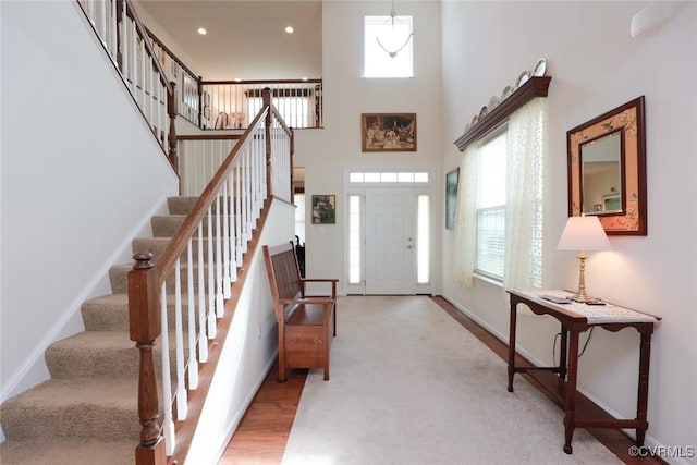 7822 James Blair Ln, New Kent, VA 23124 - foyer entrance featuring plenty of natural light, stairs, a high ceiling, and recessed lighting