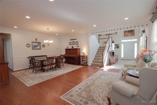 7822 James Blair Ln, New Kent, VA 23124 - dining space featuring stairway, a chandelier, wood finished floors, and recessed lighting