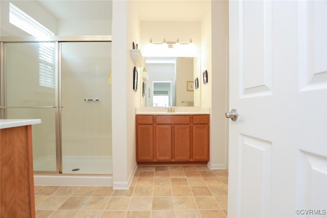 7822 James Blair Ln, New Kent, VA 23124 - full bathroom with vanity, a shower stall, and plenty of natural light