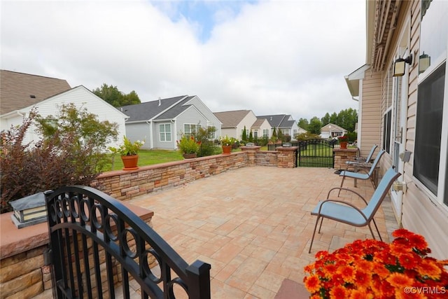 7822 James Blair Ln, New Kent, VA 23124 - view of patio / terrace with a gate and a residential view