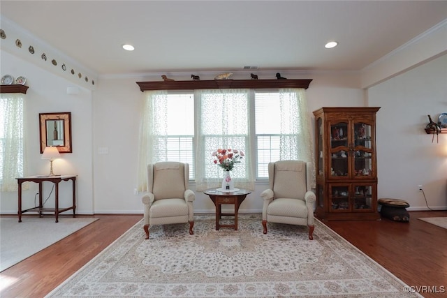 7822 James Blair Ln, New Kent, VA 23124 - living area with wood finished floors, crown molding, and recessed lighting
