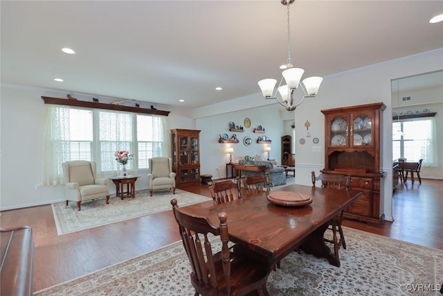 7822 James Blair Ln, New Kent, VA 23124 - dining space featuring wood finished floors, a chandelier, recessed lighting, and crown molding