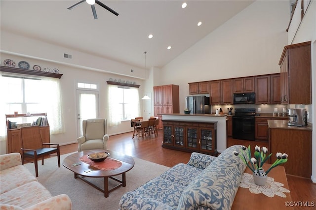 7822 James Blair Ln, New Kent, VA 23124 - living room featuring wood finished floors, recessed lighting, high vaulted ceiling, and a ceiling fan