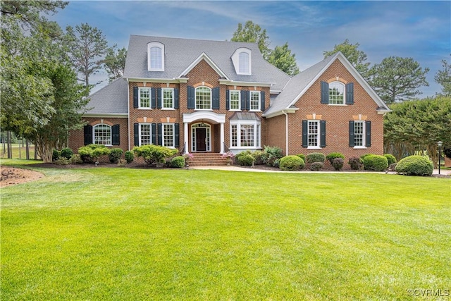 2619 Mulberry Row Rd, Midlothian, VA 23113 - colonial inspired home featuring brick siding and a front lawn
