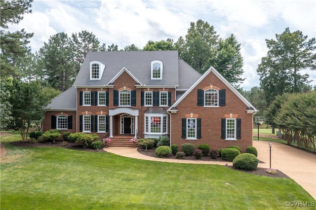 2619 Mulberry Row Rd, Midlothian, VA 23113 - colonial house with brick siding, a front lawn, and driveway