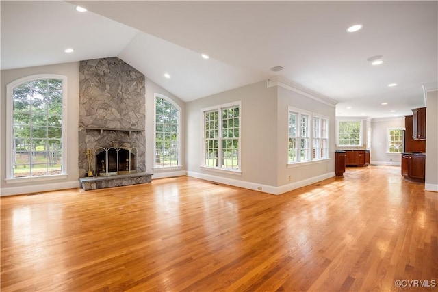 2619 Mulberry Row Rd, Midlothian, VA 23113 - unfurnished living room featuring light wood-type flooring, recessed lighting, plenty of natural light, and lofted ceiling