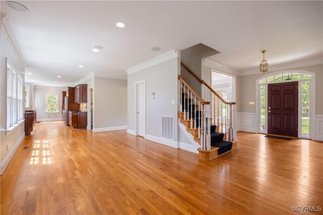 2619 Mulberry Row Rd, Midlothian, VA 23113 - entrance foyer with stairway, light wood-style floors, crown molding, a chandelier, and recessed lighting