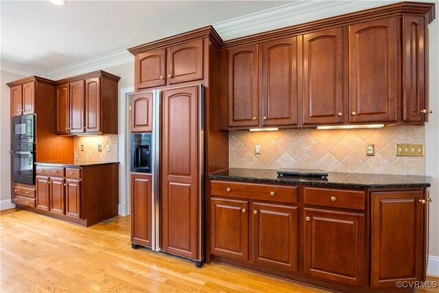 2619 Mulberry Row Rd, Midlothian, VA 23113 - kitchen featuring black appliances, light wood-type flooring, dark stone countertops, decorative backsplash, and crown molding