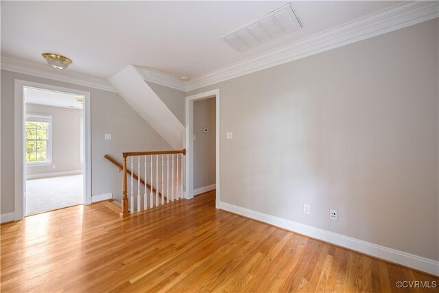 2619 Mulberry Row Rd, Midlothian, VA 23113 - spare room featuring light wood-type flooring and ornamental molding
