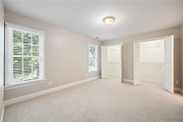 2619 Mulberry Row Rd, Midlothian, VA 23113 - unfurnished bedroom featuring carpet and multiple closets