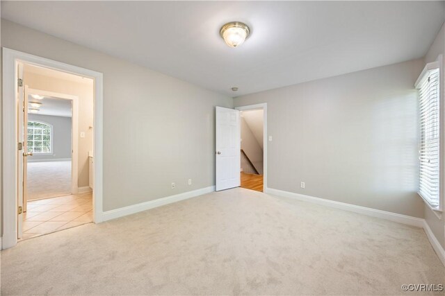 2619 Mulberry Row Rd, Midlothian, VA 23113 - unfurnished bedroom with light colored carpet and baseboards