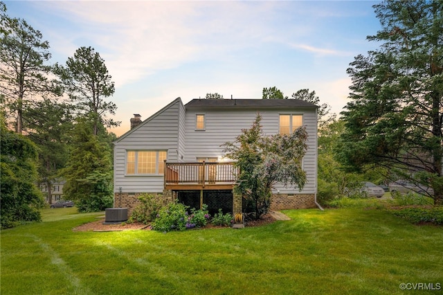 1917 Moonwind Pl, Henrico, VA 23238 - rear view of house featuring a deck, a lawn, and a chimney
