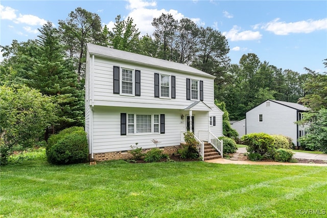 1917 Moonwind Pl, Henrico, VA 23238 - colonial inspired home featuring a front yard, crawl space, and view of wooded area