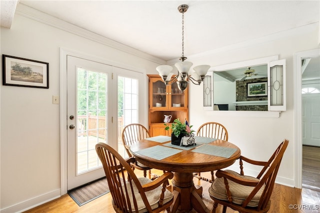 1917 Moonwind Pl, Henrico, VA 23238 - dining area featuring light wood-type flooring, ornamental molding, and a chandelier