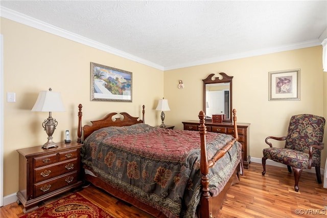 1917 Moonwind Pl, Henrico, VA 23238 - bedroom featuring wood finished floors, ornamental molding, and a textured ceiling