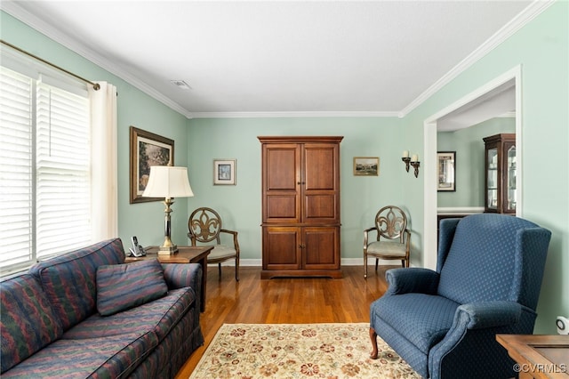 1917 Moonwind Pl, Henrico, VA 23238 - living area featuring light wood-type flooring and crown molding