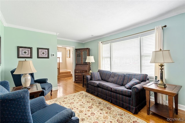 1917 Moonwind Pl, Henrico, VA 23238 - living area with plenty of natural light, ornamental molding, wood finished floors, and stairway