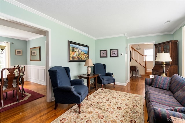 1917 Moonwind Pl, Henrico, VA 23238 - living area with crown molding, stairs, wood finished floors, and wainscoting