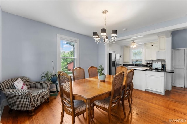 104 E 5th St, Mineral, VA 23117 - dining area with a chandelier, light wood-style floors, and ceiling fan