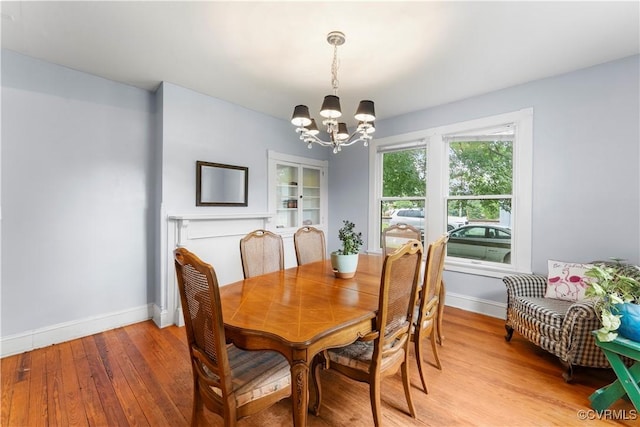 104 E 5th St, Mineral, VA 23117 - dining room with a chandelier and light wood finished floors