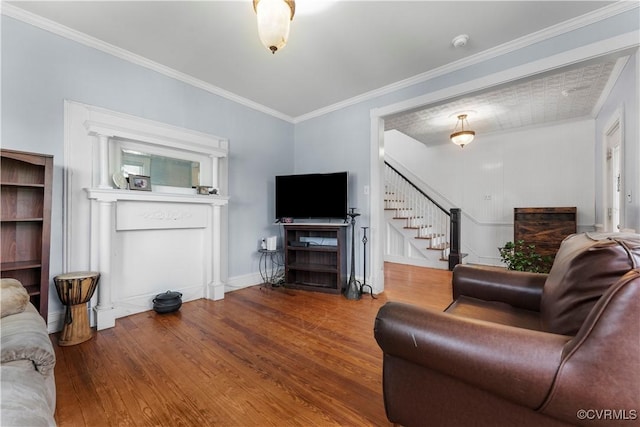 104 E 5th St, Mineral, VA 23117 - living area with stairway, wood finished floors, and crown molding