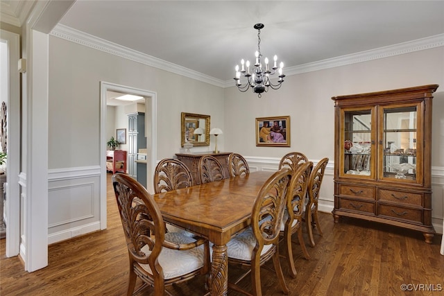 2104 Apple Grove Rd, Mineral, VA 23117 - dining area with a chandelier, dark wood-style floors, ornamental molding, a wainscoted wall, and a decorative wall