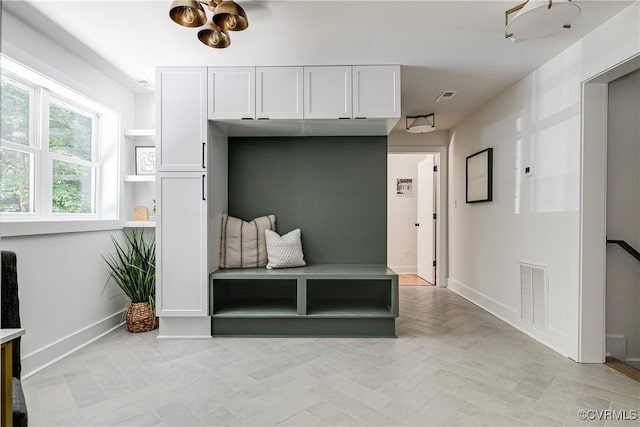 7418 Cherokee Rd, Richmond, VA 23225 - mudroom featuring baseboards