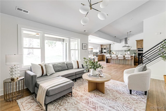 7418 Cherokee Rd, Richmond, VA 23225 - living room featuring light wood-style floors and lofted ceiling