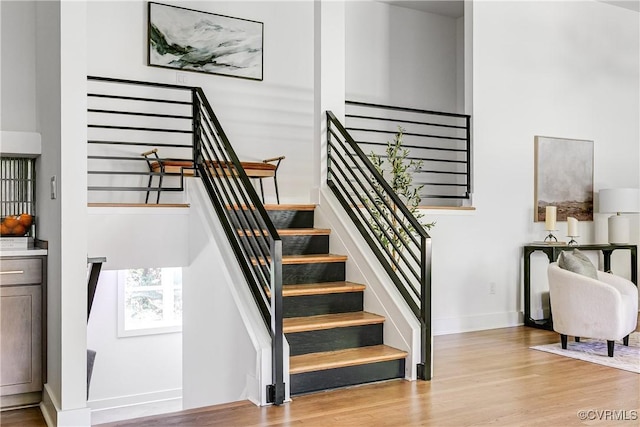 7418 Cherokee Rd, Richmond, VA 23225 - stairs featuring wood finished floors and baseboards