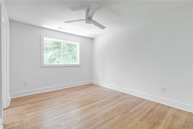 7418 Cherokee Rd, Richmond, VA 23225 - empty room with light wood-style floors and a ceiling fan