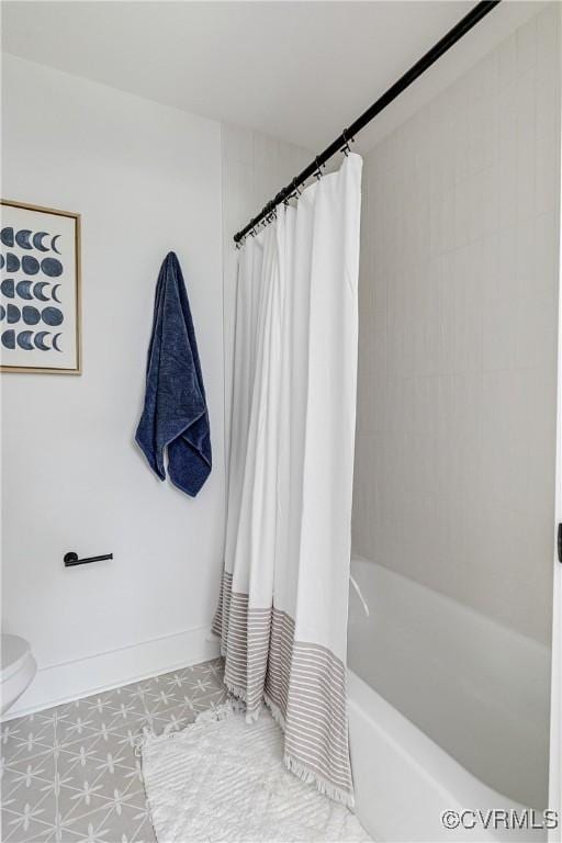 7418 Cherokee Rd, Richmond, VA 23225 - bathroom with tile patterned floors and shower / tub combo with curtain