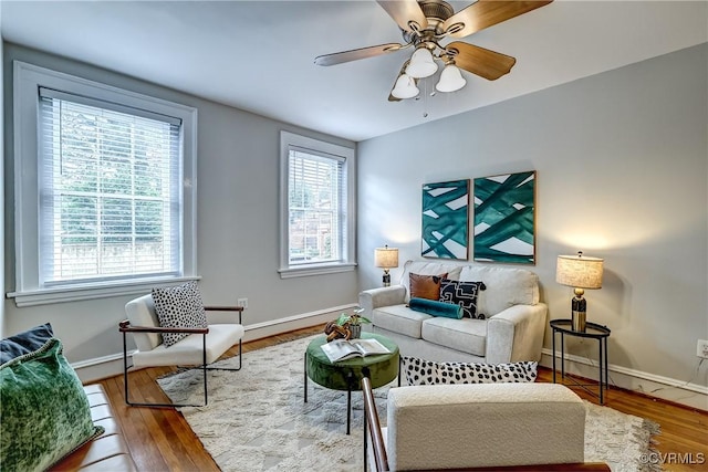 2710 Stuart Ave Unit U3, Richmond, VA 23220 - living area featuring healthy amount of natural light, wood finished floors, and a ceiling fan