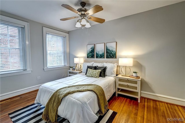 2710 Stuart Ave Unit U3, Richmond, VA 23220 - bedroom featuring multiple windows, wood finished floors, and ceiling fan