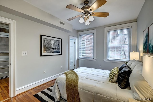 2710 Stuart Ave Unit U3, Richmond, VA 23220 - bedroom with wood finished floors and a ceiling fan