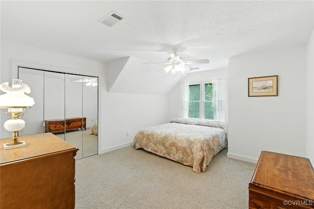 4800 Bailey Branch Ln, Quinton, VA 23141 - carpeted bedroom featuring a closet, vaulted ceiling, and a ceiling fan