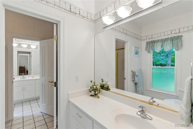 4800 Bailey Branch Ln, Quinton, VA 23141 - bathroom featuring tile patterned floors, vanity, and a shower with door