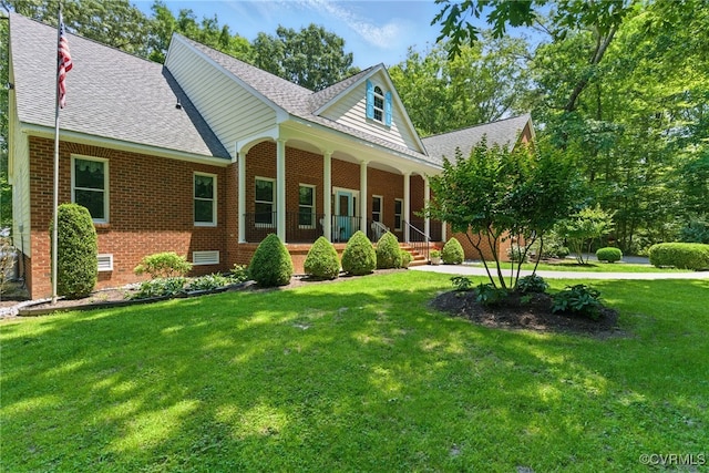 4800 Bailey Branch Ln, Quinton, VA 23141 - view of front facade with a porch, roof with shingles, brick siding, and a front yard