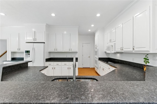 4800 Bailey Branch Ln, Quinton, VA 23141 - kitchen featuring white appliances, recessed lighting, white cabinetry, crown molding, and light wood-style floors