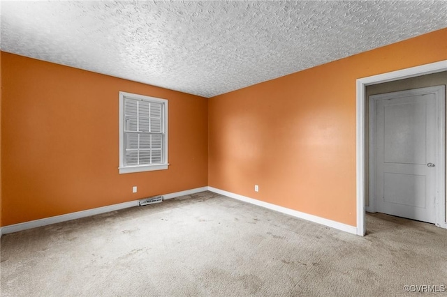 200 Hargrave Ave, Colonial Heights, VA 23834 - carpeted empty room with baseboards and a textured ceiling
