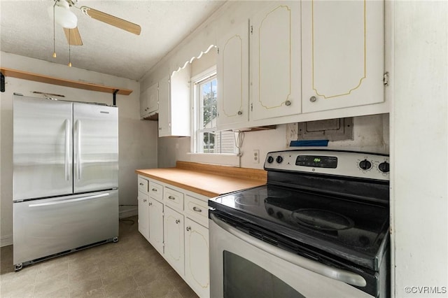 200 Hargrave Ave, Colonial Heights, VA 23834 - kitchen featuring appliances with stainless steel finishes, white cabinets, ceiling fan, light tile patterned flooring, and a textured ceiling