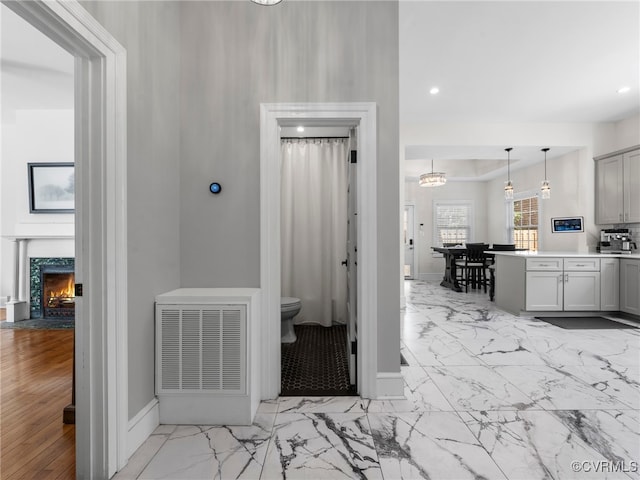 130 N Jefferson St, Petersburg, VA 23803 - hall with light marble finish flooring and recessed lighting