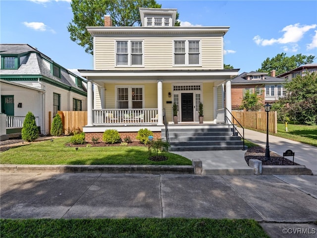 130 N Jefferson St, Petersburg, VA 23803 - american foursquare style home with a porch and a chimney
