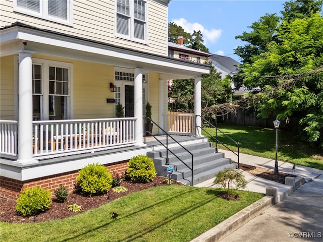 130 N Jefferson St, Petersburg, VA 23803 - entrance to property featuring a porch and a lawn