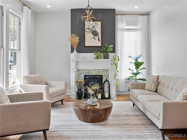 130 N Jefferson St, Petersburg, VA 23803 - living area with healthy amount of natural light, a fireplace, recessed lighting, and wood finished floors