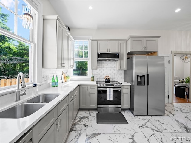 130 N Jefferson St, Petersburg, VA 23803 - kitchen featuring stainless steel appliances, gray cabinetry, light marble finish floors, backsplash, and recessed lighting